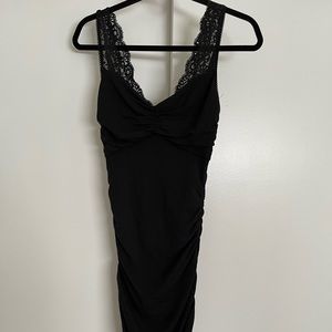 Cute Express Black Dress with lace trim on neck and back - size XS